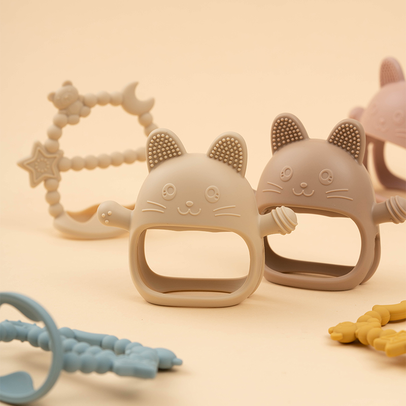 Gryzak dla niemowląt, silikono – Teething Mitten Baby recenzja i cena